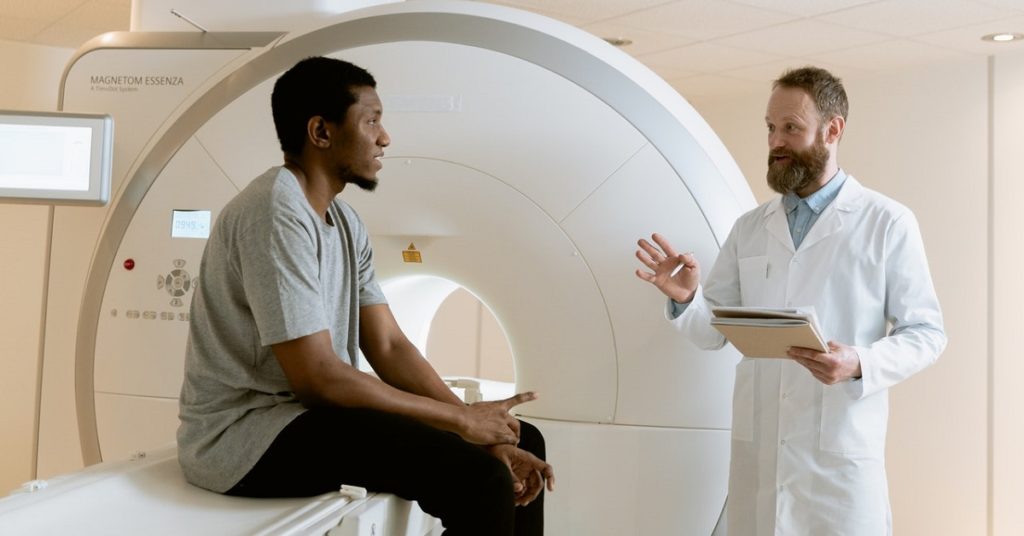 A pharmacist telling a patient about viagra in Sheffield