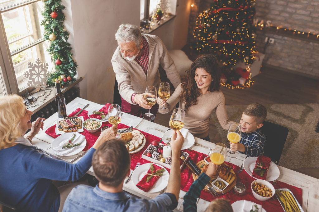 High Angle View Of A Beautiful Happy Family Gathered Around The