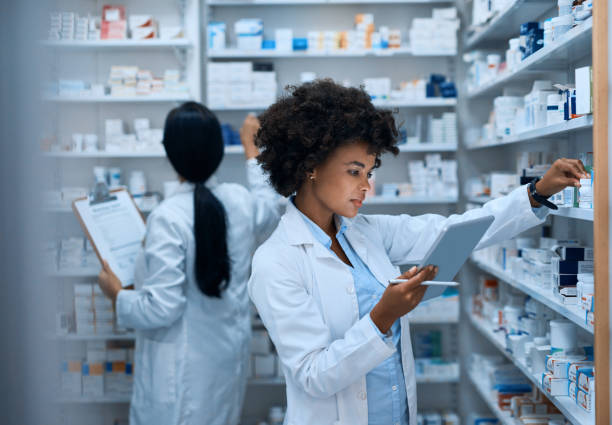 Shot of a young woman doing inventory