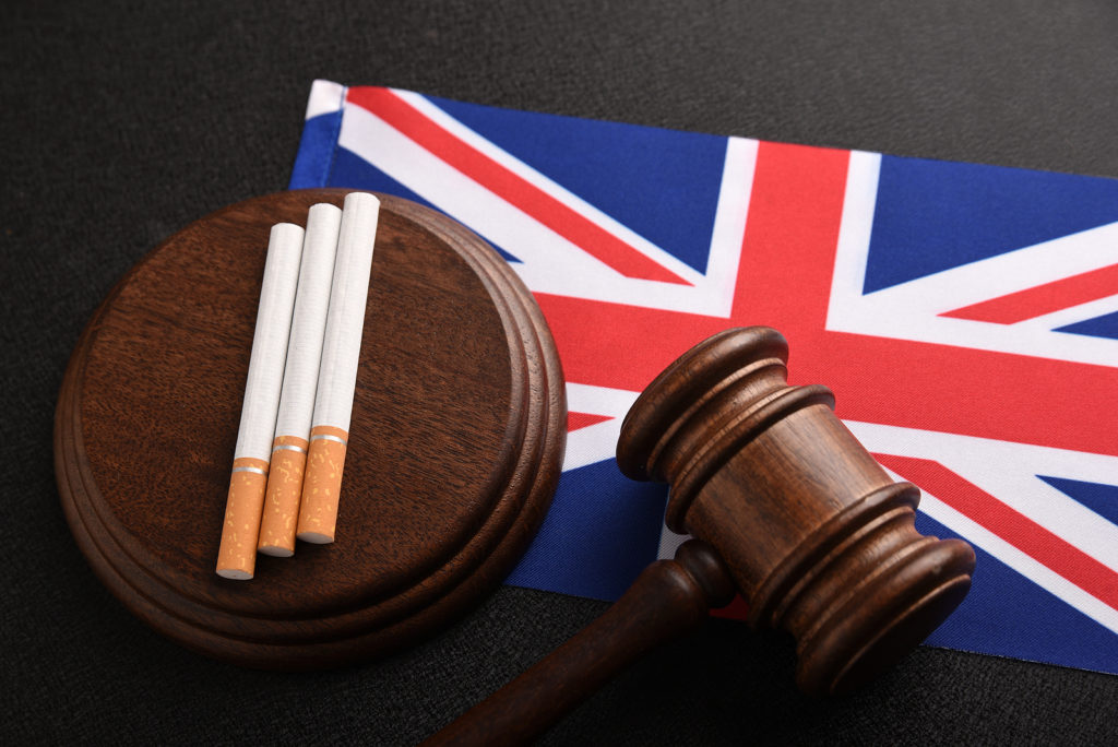 Flag Of Great Britain, Cigarettes And Judge Gavel. Tobacco Law I
