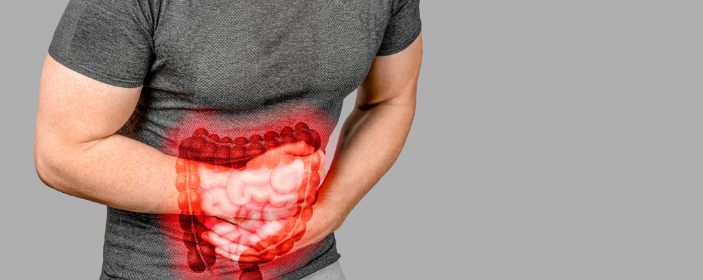 Intestinal Inflammation. Irritable Bowel Syndrome. Man Touching